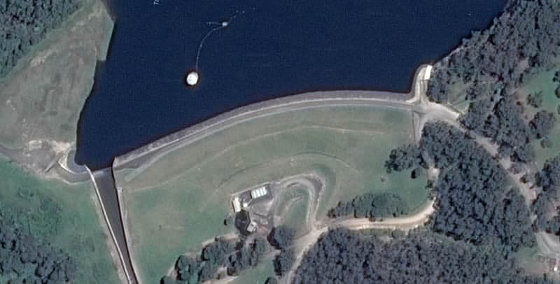 Dam with reservoir aerial view