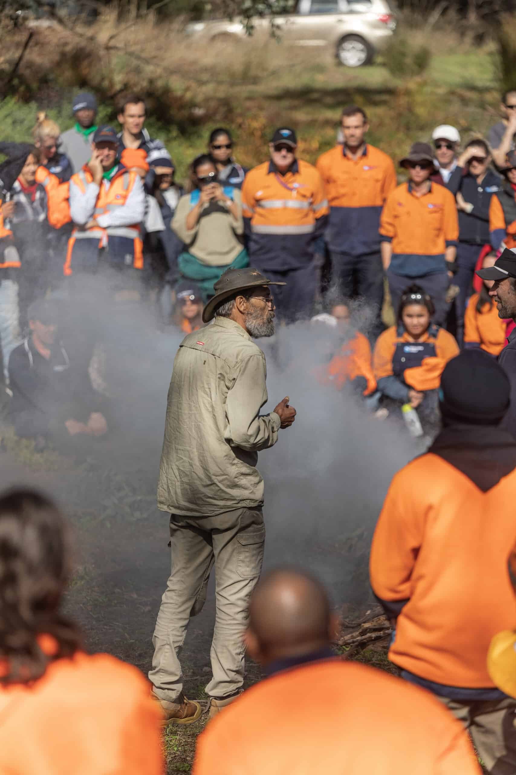 Man speaking to a crowd