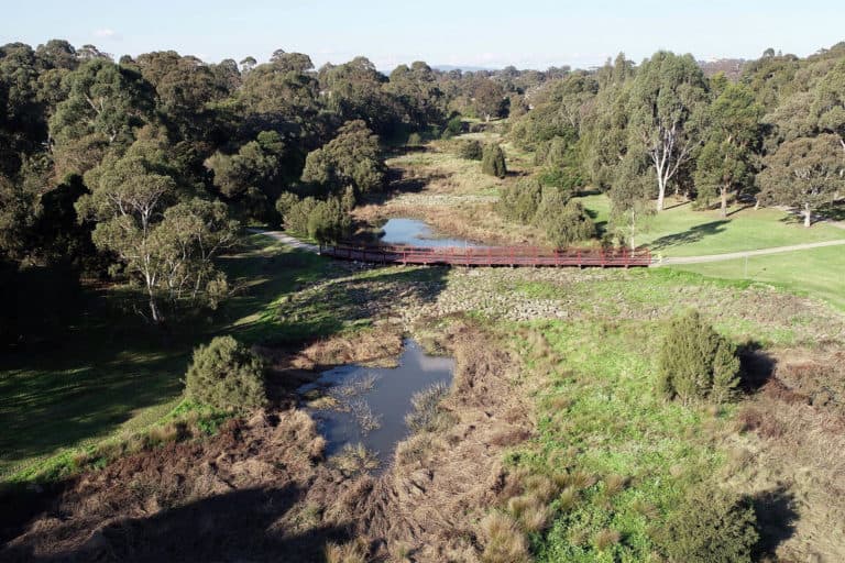Wooden bridge over creek