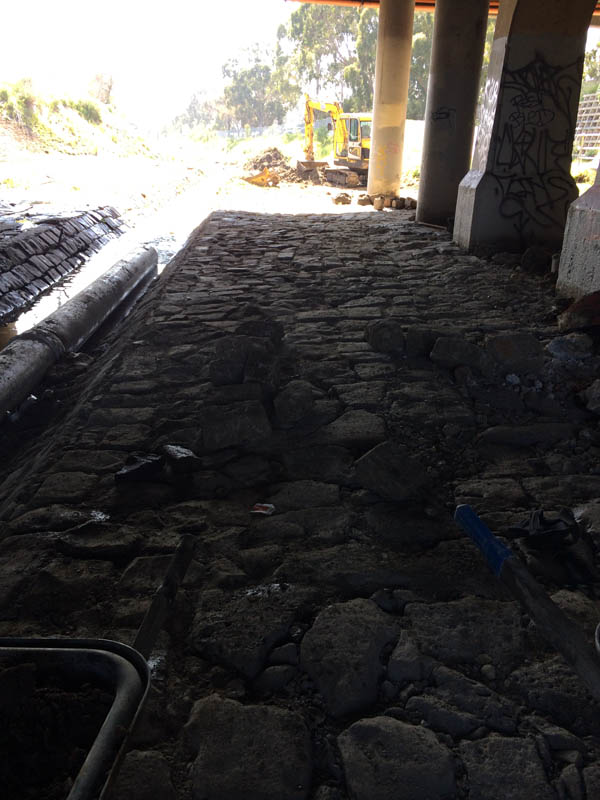Stone pathway under bridge