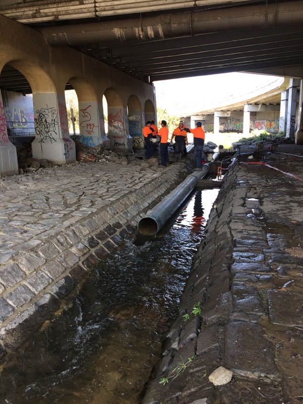 Drainage channel repair under bridge