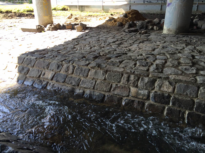 Stone bridge support under water