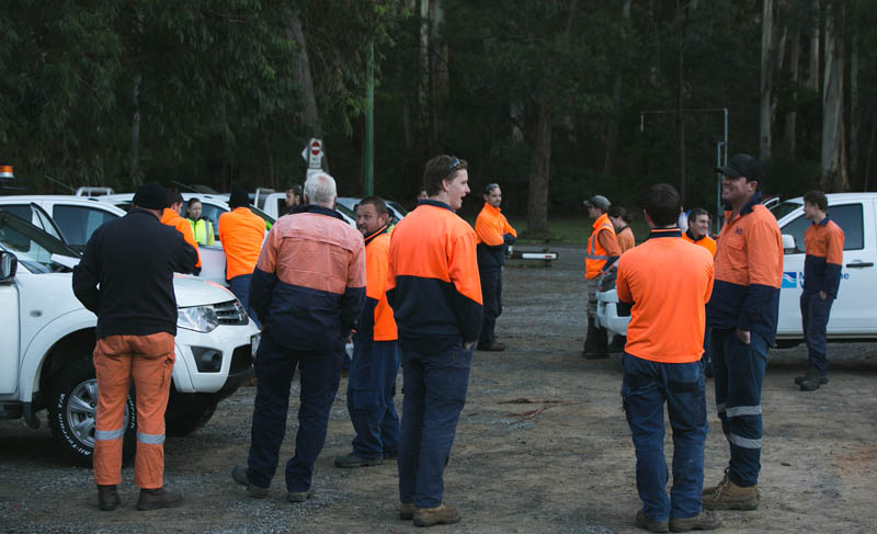 Workers gather in meeting