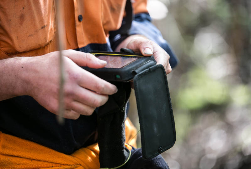 Man holds GPS device