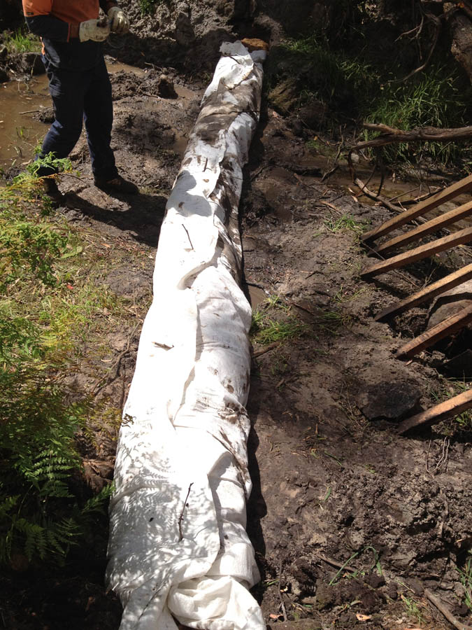 Drainage pipe installation in ground