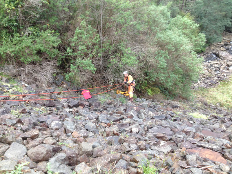 Man working in rocky terrain