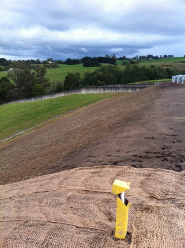 Yellow marker on rural landscape