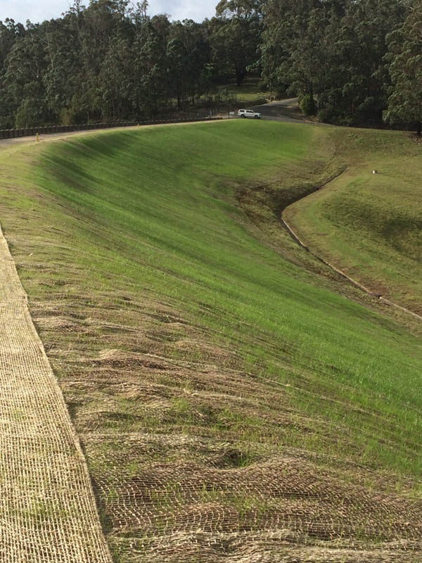Erosion control mat on slope