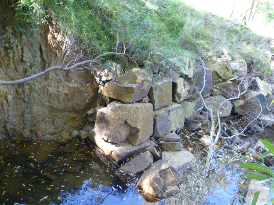 Stone wall by water