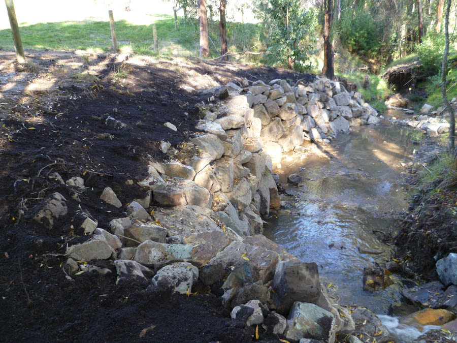 Stone wall near stream