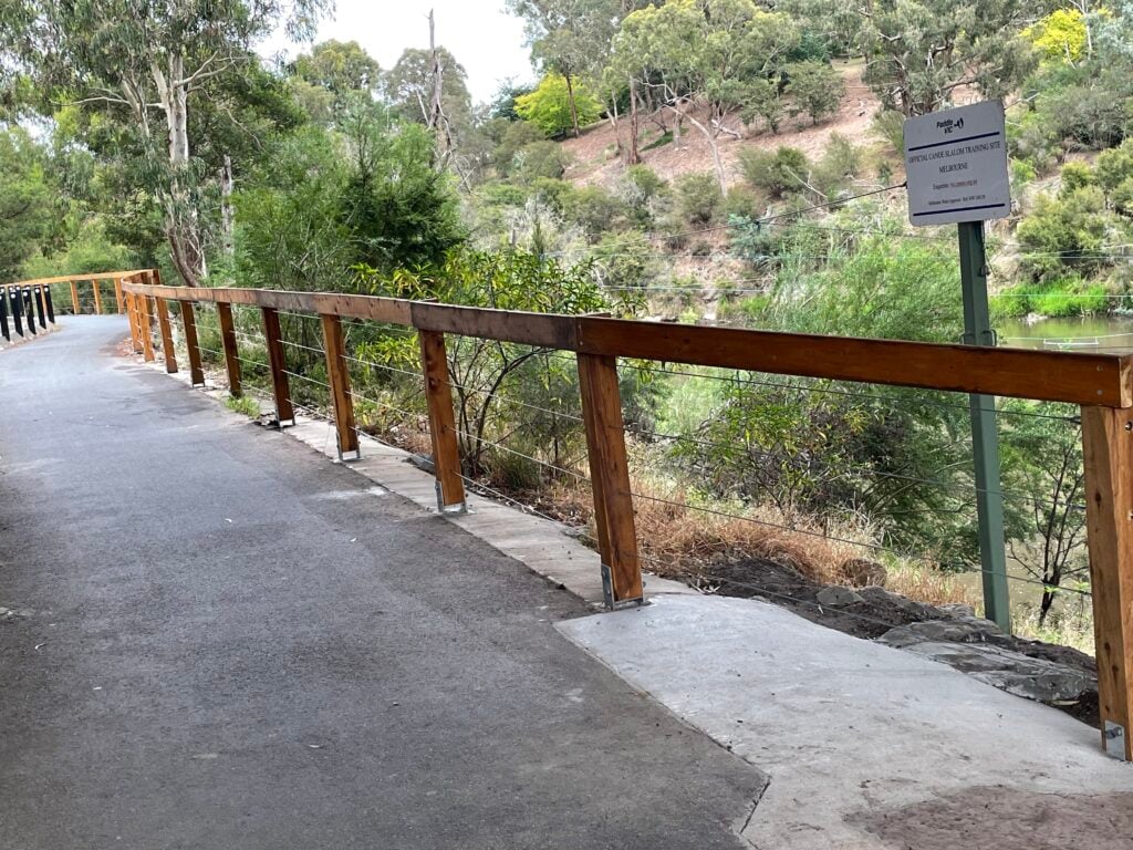 Wooden railing on park path