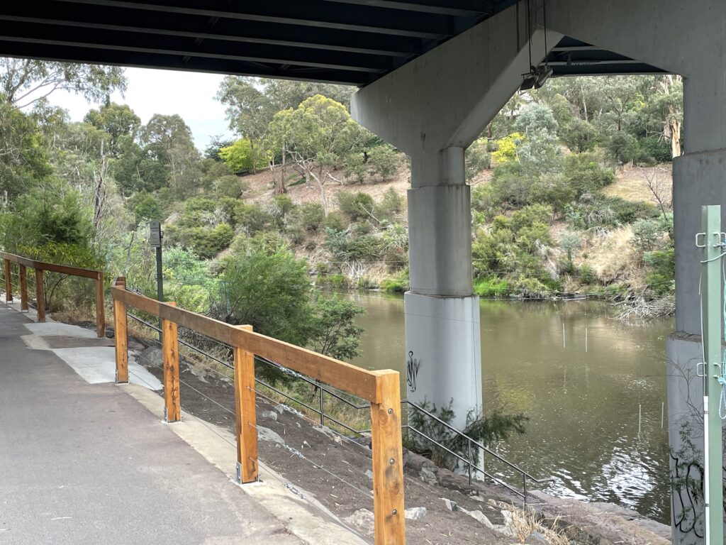 Trail beside river and bridge