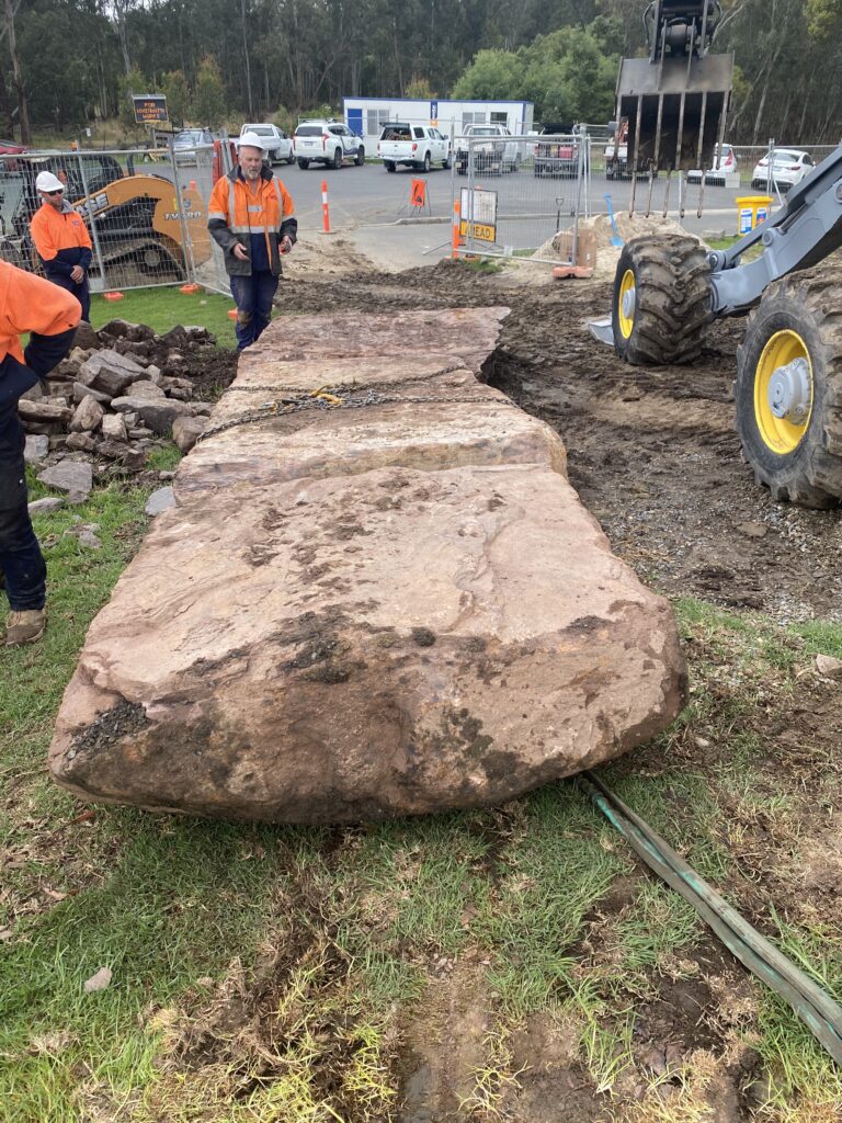 Large rock at construction site