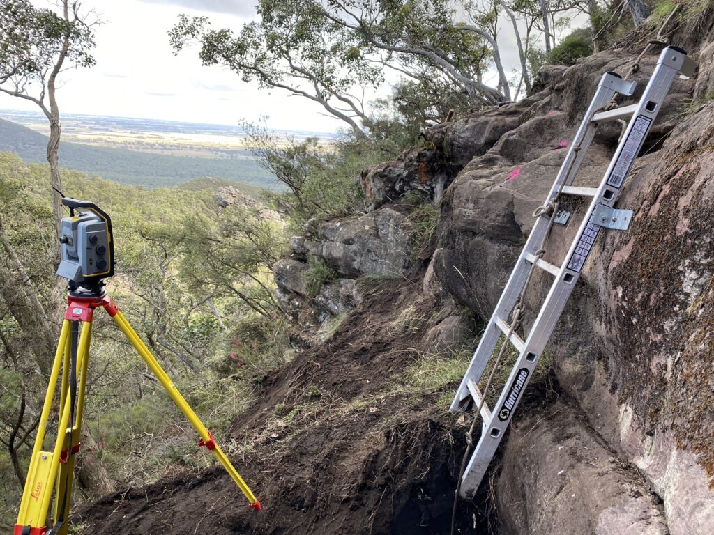 Survey equipment on rocky slope